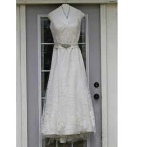 Oleg Cassini A- line wedding dress & veil